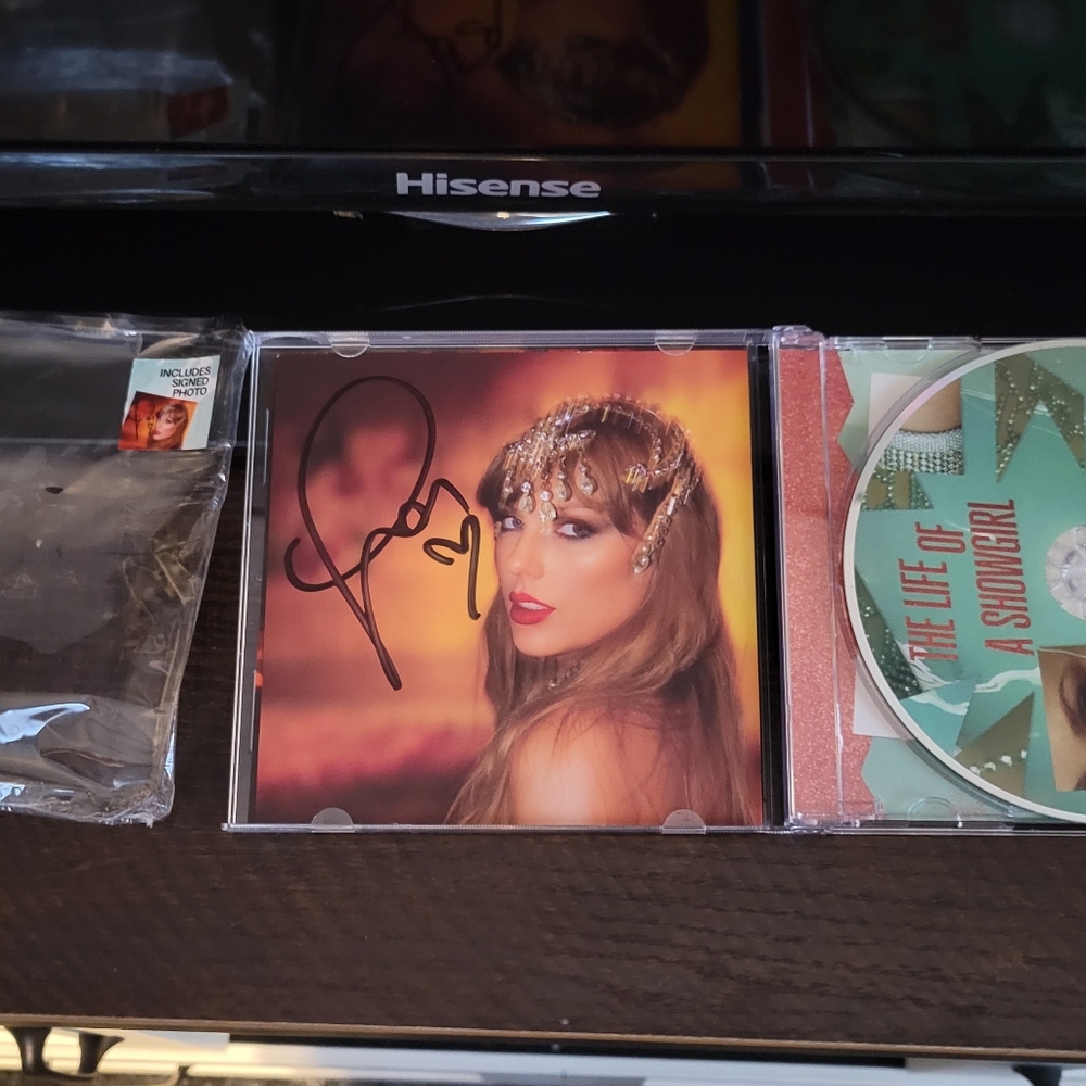 4 Taylor Swift CD with Green and Orange Cover